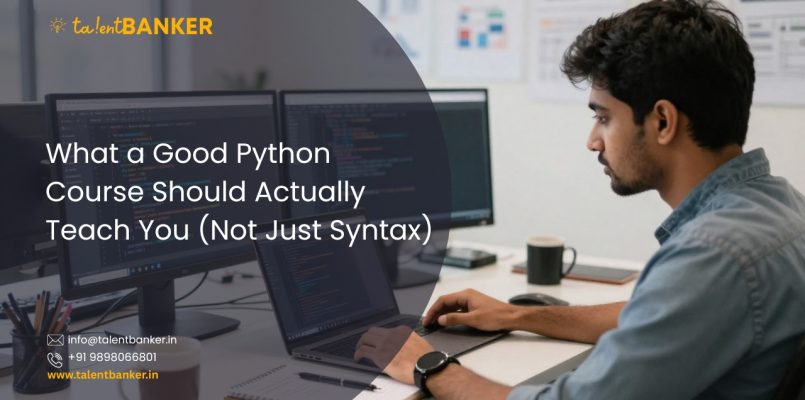 Indian student working on Python programming on a dual-screen setup in a modern learning workspace
